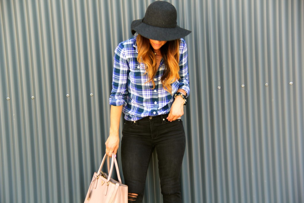 floppy hat, plaid top, distressed denim 