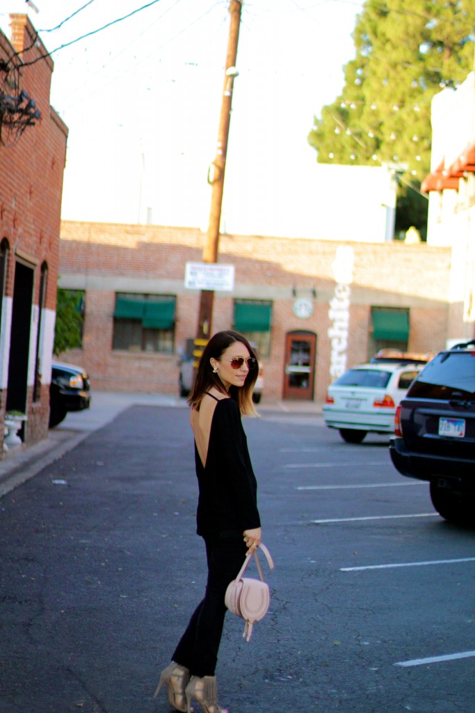 black backless top, all black outfit 