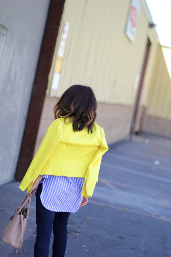 yellow jacket, blue and white striped top